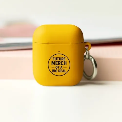 A yellow Airpods case with black text that says Future Merch of a Big Deal representing tech accessory promotional products available in our store for same-day online ordering in Phoenix .